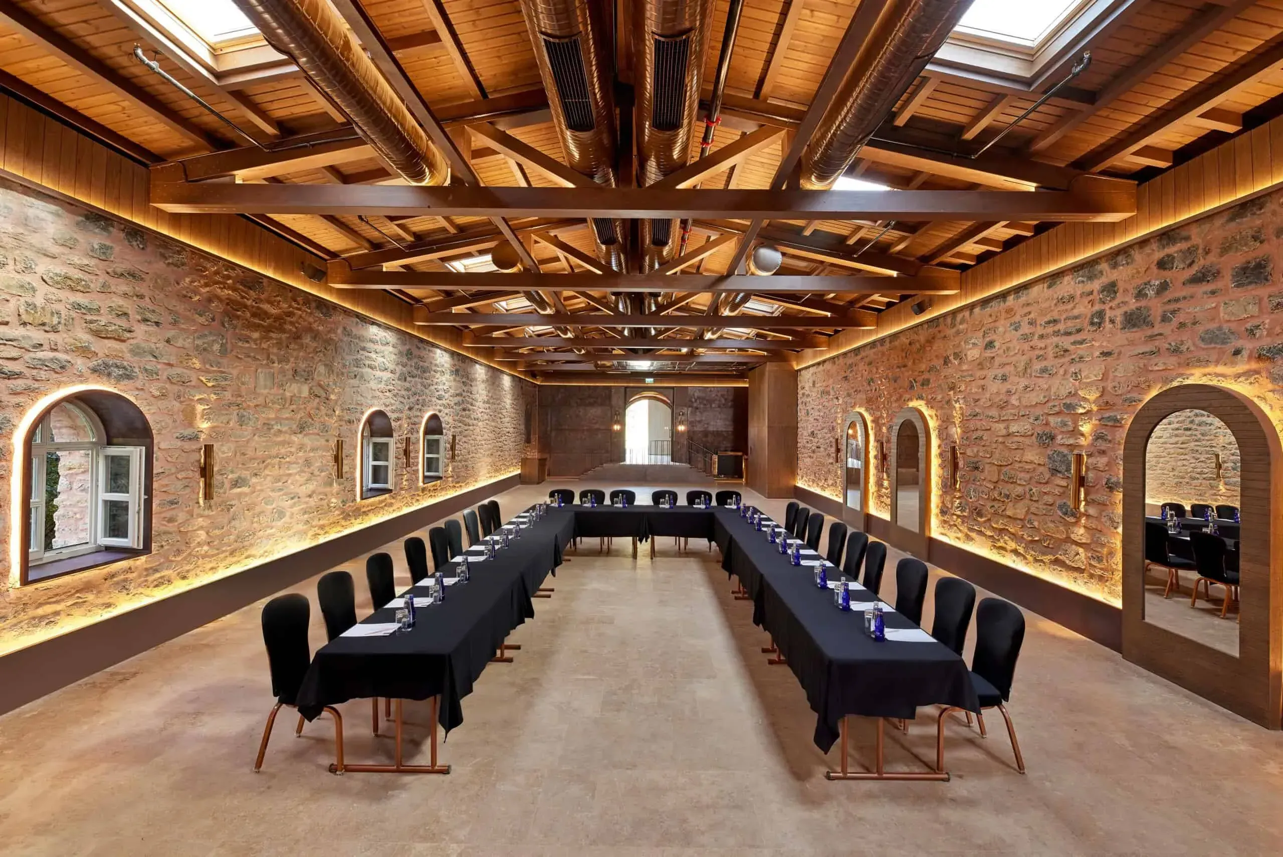 A rustic and historic stone event warehouse for rent.webp