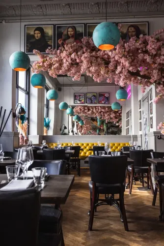 Romantic Industrial Bistro Blending Bold Colours and Elegant Vibes for Relaxed Dining