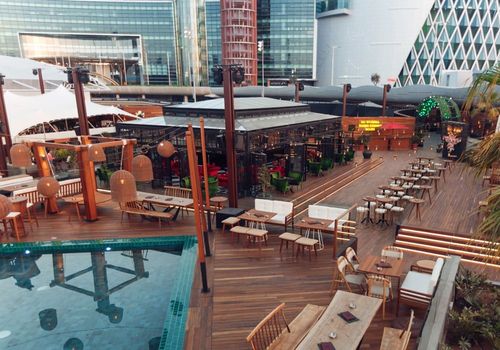 Lush Rooftop Oasis With Eclectic Decor for Vibrant Corporate Events