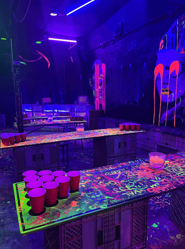 Distinctive Bar With Vibrant Neon Lights Perfect for Unforgettable Celebrations and Energetic Gatherings