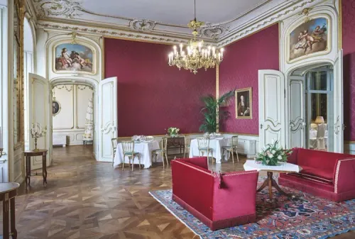 Viennese Rococo Room With Red Damask Walls for Intimate Gatherings