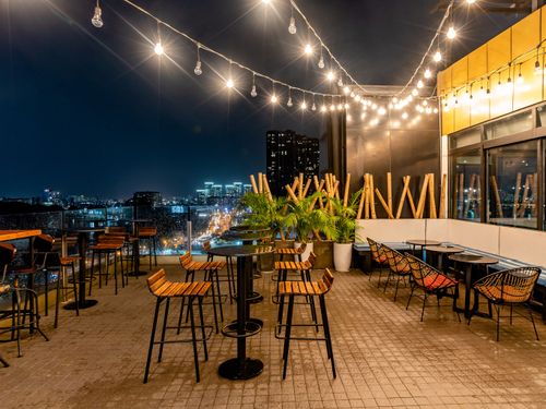 Chic Urban Rooftop Bar With Pool and City Views for Social Gatherings