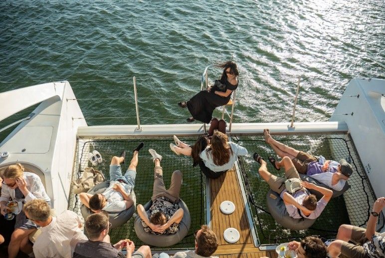 Sunset boat cruise along Lisbon’s coastline—final gathering before departures. (Source- Eventflare).jpg