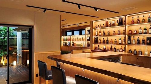 Whisky Haven With Timber Warmth and Zen Garden Patio for Intimate Gatherings and Exclusive Tastings