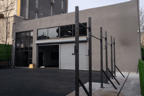 Raw Industrial Gym Space for Dynamic Corporate Fitness Campaigns