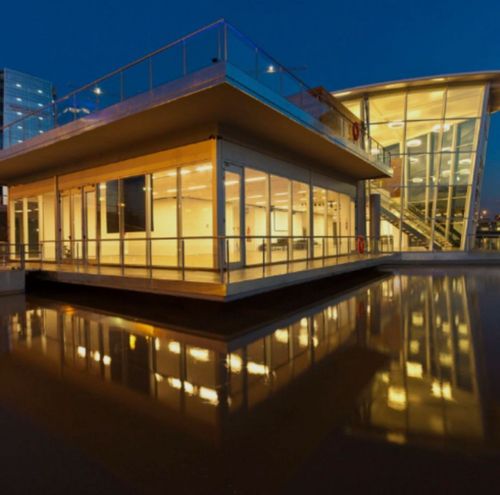 Glass-Walled Hall Above the River With Breathtaking City Views
