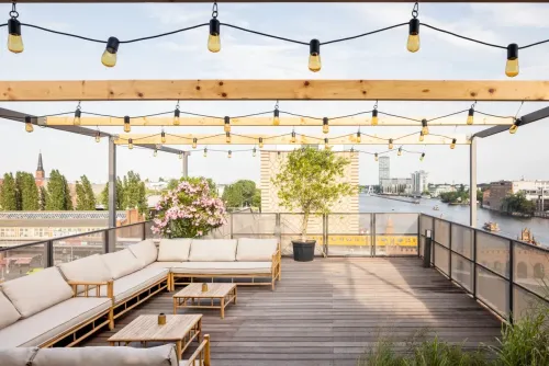 Riverside Loft With Roof Terrace, Spree Views and Rustic-Industrial Charm for Business Retreats and Celebrations