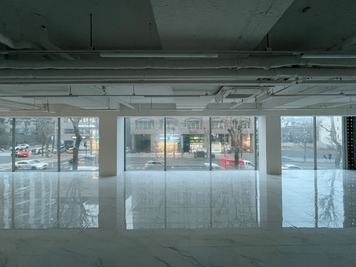 Contemporary-Minimalist Urban Media Space With LED and Cityscape Backdrop for Digital Experiential Events
