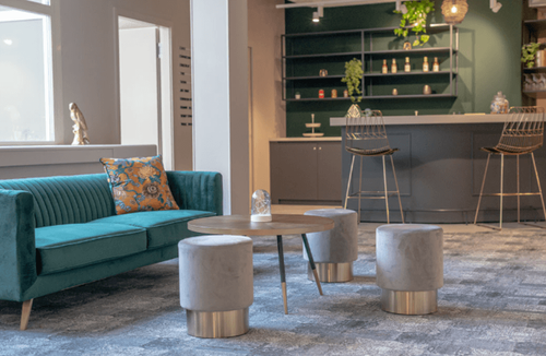 Mid-Century Lounge With Plush Seating and Curved Bar Counter