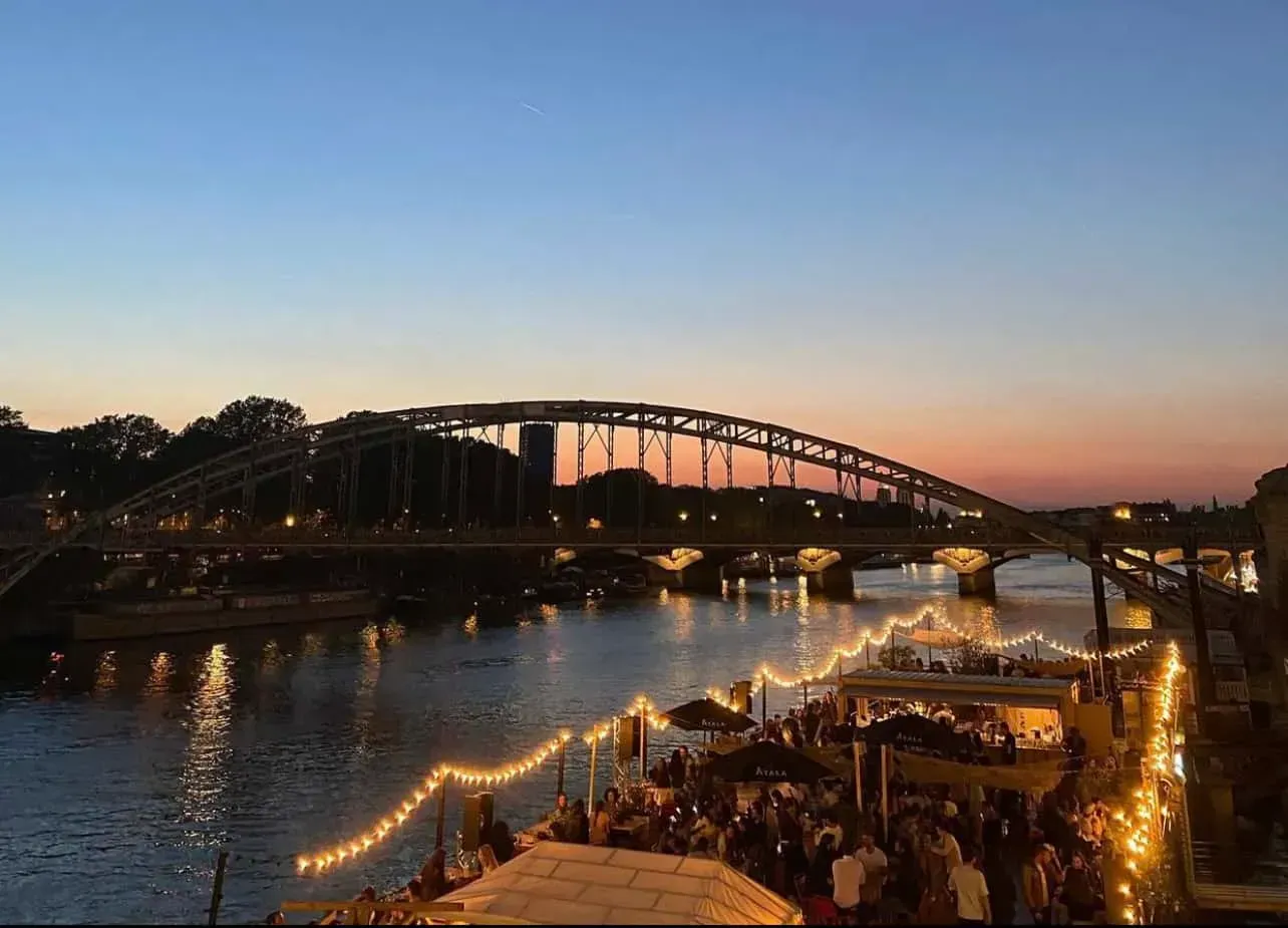 A high-end venue in Paris on a floating rooftop restaurant.webp