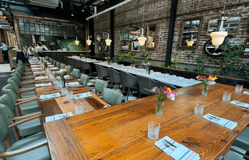 Industrial-Chic Dining Setting With a Flexible Table Layout for Corporate Gatherings
