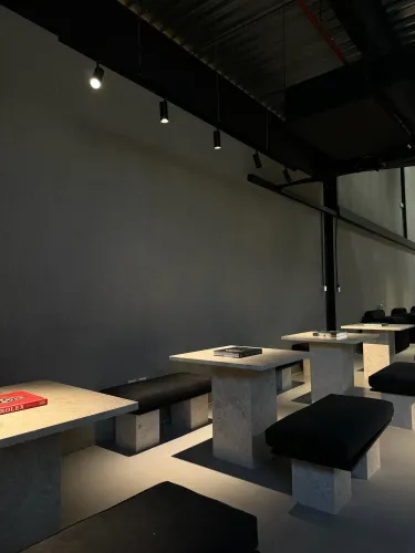 Sleek Industrial Loft With Stone Accents for Productive Brainstorming