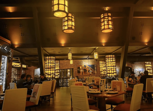 Industrial Brick Banquet Hall With Wine Wall for Receptions
