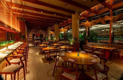 Modern Wooden Design Meets Culinary Craft in a Stunning Setting