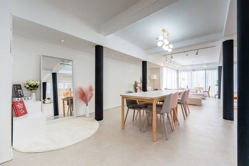 Modern Loft With Pink Accents and Black Accents for Stylish Events