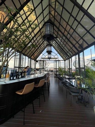 Cabana-Style Rooftop With City Views Perfect for Parties and Dinners