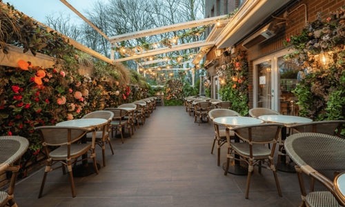 Chic Urban Lounge With a Lush Garden Terrace for Team Celebrations