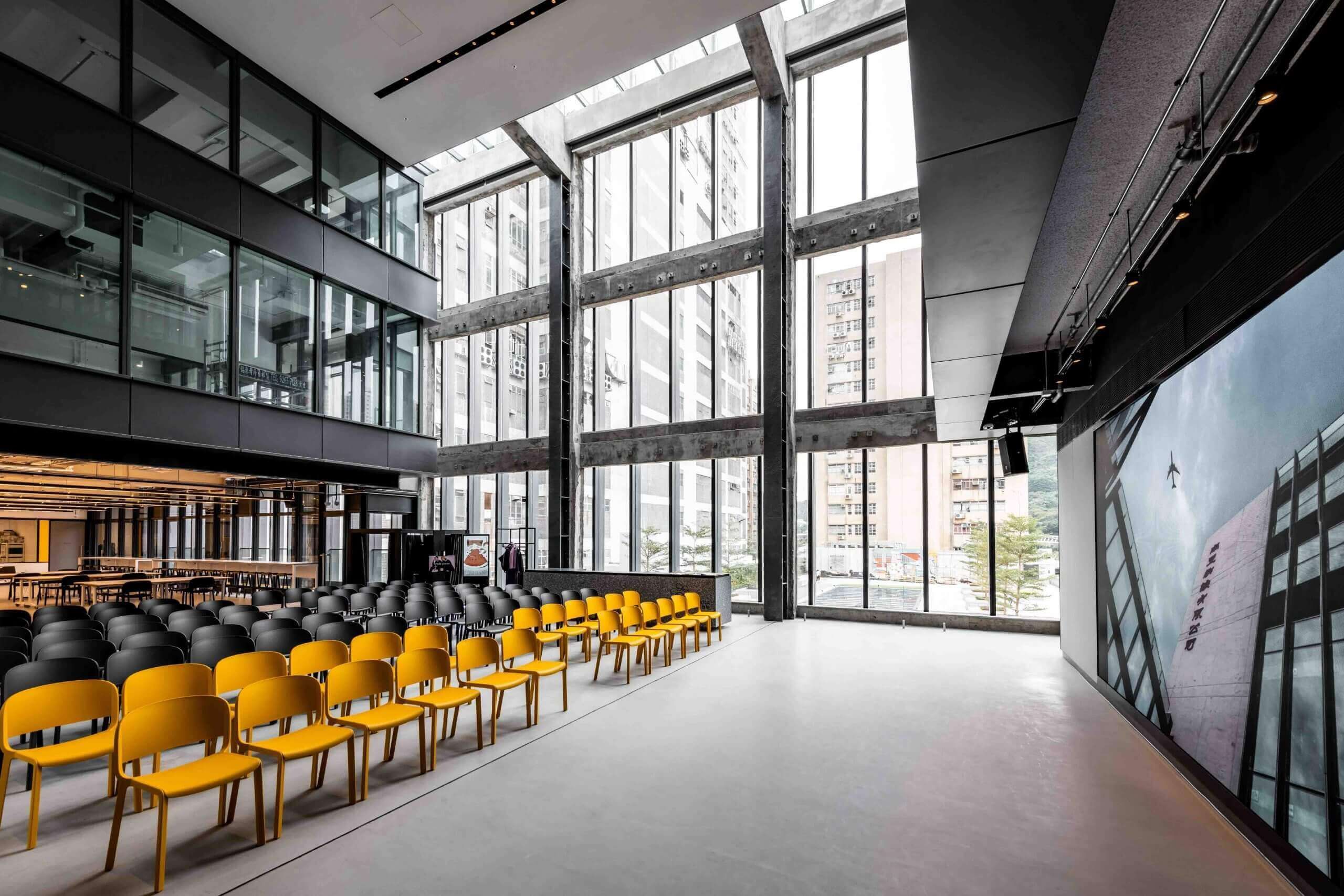 Sleek event venue with towering glass walls.jpg
