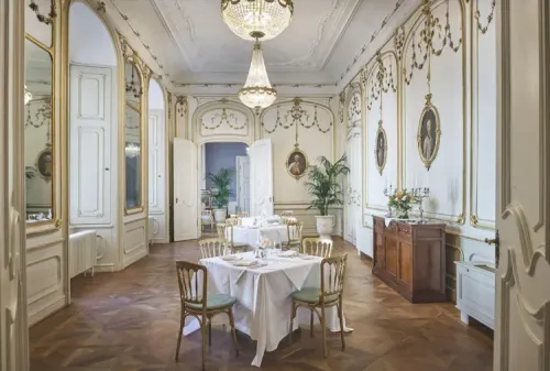 Rococo Parlour With Gilded Portraits and Mirrors for Executive Dinners