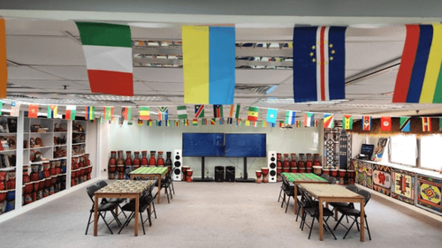 Eclectic Event Studio With Cultural Displays and Hands-On Materials for Immersive Sessions