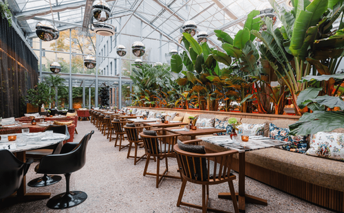 Greenhouse Style Venue With Silver Lamp Balls