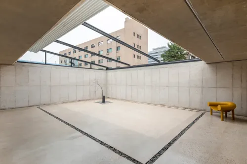 Skylit Zen Atrium With Garden Access for Product Showcases