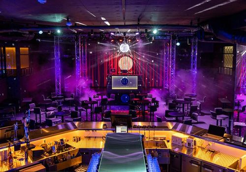 Vibrant Nightclub With Dazzling Lights and Luxe Bar for Electrifying Events