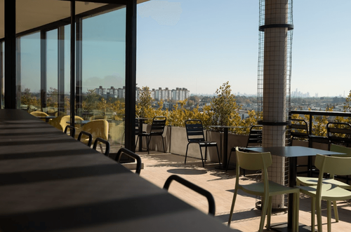 Sunlit Rooftop Terrace With Historic Dome Views for Networking
