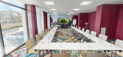 Light-Filled Meeting Space With Art Deco Flair and Outdoor View