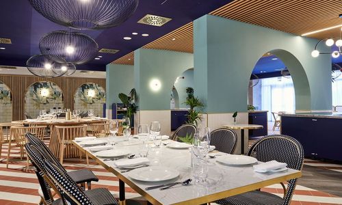 Contemporary Event Space with Sculptural Arches and Rich Décor for Chic Soirées