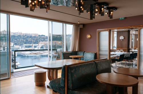 Rooftop Room With Marina Views and Curved Wood for Private Dining