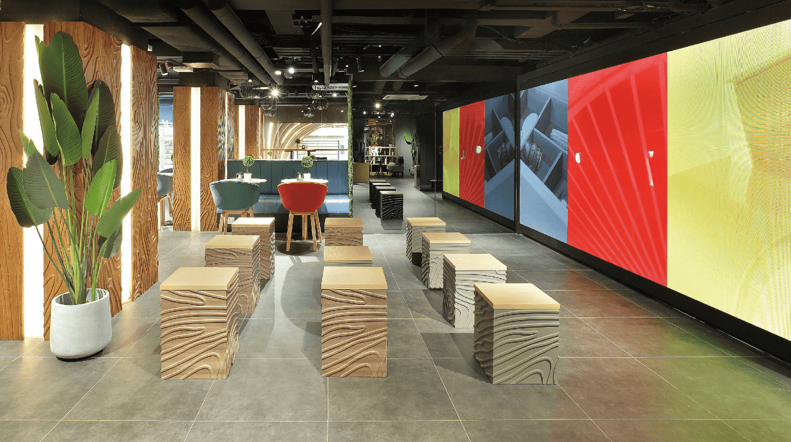 Open layout spacious venue with a large LED screen.png