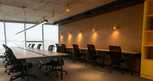 Industrial Boardroom With Floor-to-Ceiling Windows for Workshops
