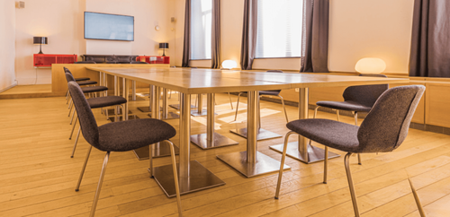  Crisp Wood-Floored Boardroom With Clean Lines and Courtyard Views for Strategy Sessions
