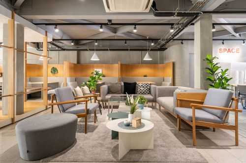 Minimalist Industrial Hub for Creative Workshops and Group Work Sessions