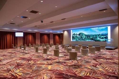 Expansive Event Venue With Led Wall and Elegant Foyer for Conventions