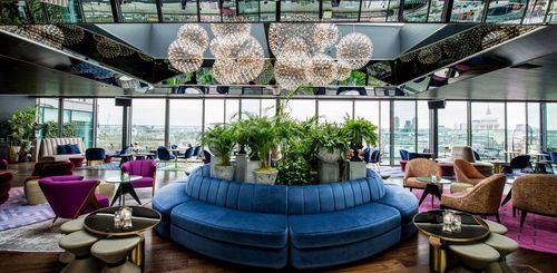 Skyline Elegance With Vibrant Plush Furnishings for Exclusive Gatherings. Sea Containers. 12th Knot
