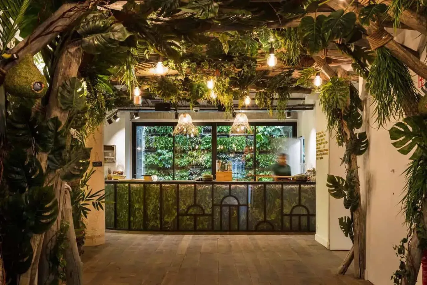 A corporate event venue steeped in jungle elements in Paris.webp