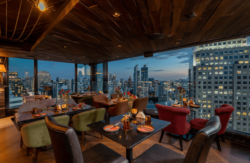 Rustic-Chic Rooftop Bar With Warm Wooden Tones