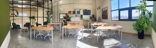 Industrial-Chic Mezzanine With Warm Interiors for Workshops and Team Retreats