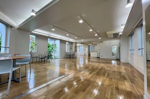 Serene Space With Polished Wooden Floors and Green Balcony for Inspiring Events