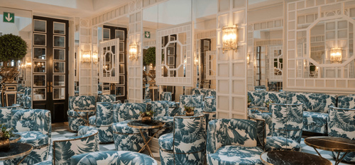 Victorian-Style Salon With Mirrored Walls for Private Gatherings