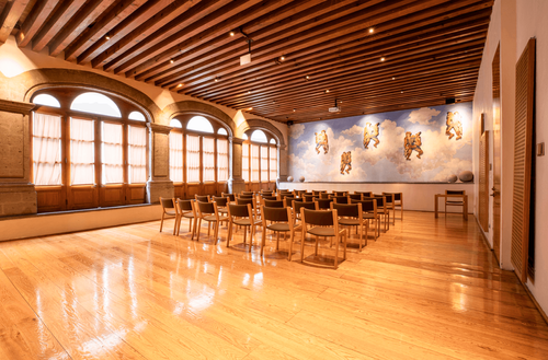 Colonial Ballroom With Murals and Vaulted Stone Arches