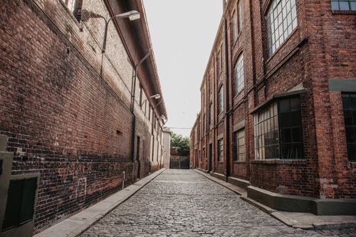 A Unique Open-Air Setting in a Brick-Lined Industrial Street for Impactful Occasions