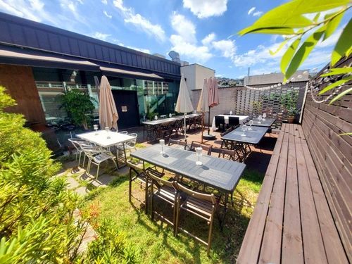 Timber-Deck Rooftop Garden With Indoor Loft for Team Cook-outs and Dinners